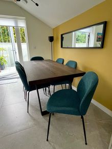 Stylish modern dining table in good condition.