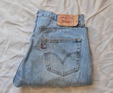 Vintage levis 501 Size 34/30 button fly light blue in good condition