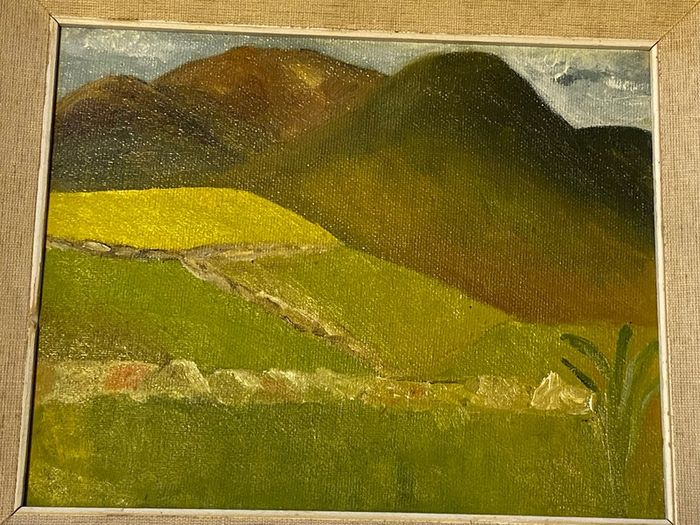 An original regional landscape painting depicting a mountainous Irish rural scene with traditional dry-stone walls, rolling green pastures, and a patch of bright yellow crop or gorse under an overcast sky