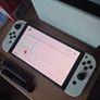 Nintendo switch oled + Game Image 7