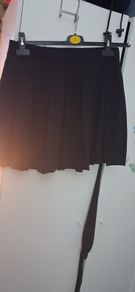 skirt  never worn says xl but it more 8 to 10