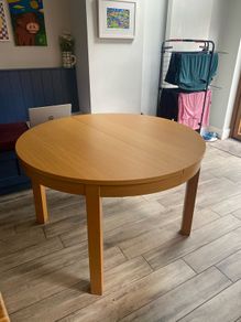 Round extending kitchen table and 4 chairs