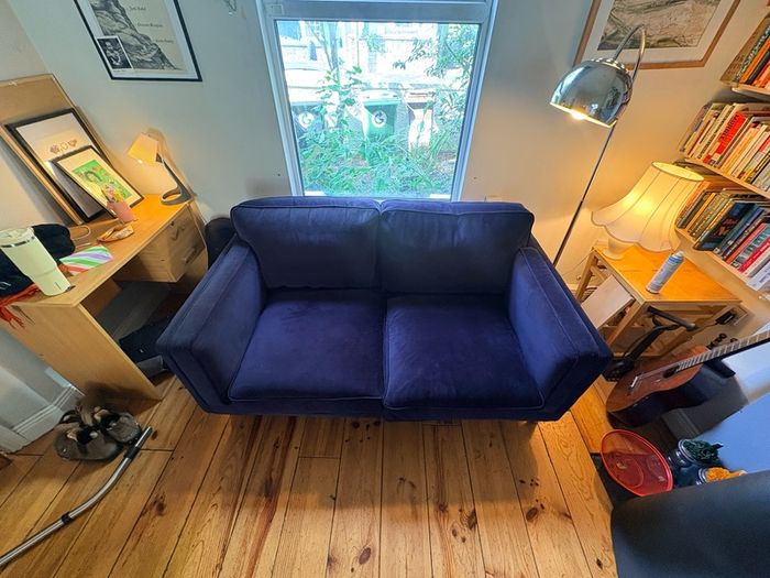 Two seater couch in navy velvet for sale