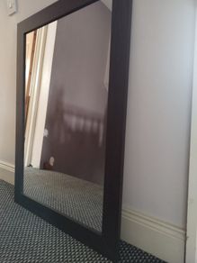 Dark brown wood mirror