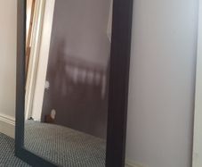 Dark brown wood mirror