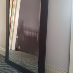 Dark brown wood mirror