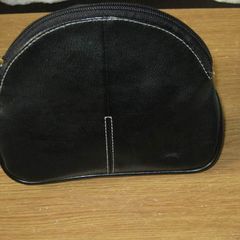 Black faux leather cosmetics bag with gold zip