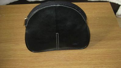 Black faux leather cosmetics bag with gold zip