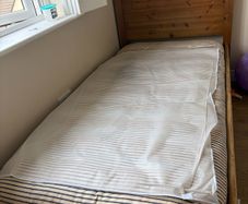Two single beds with futon mattress