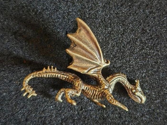 4 brass dragons.