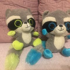 2 Cute raccoon soft toy.