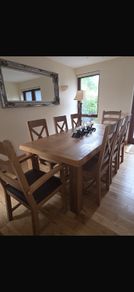 solid oak table and 8 chairs