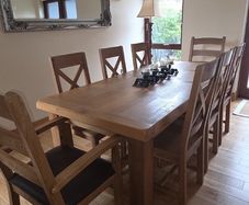 solid oak table and 8 chairs