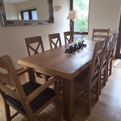 solid oak table and 8 chairs