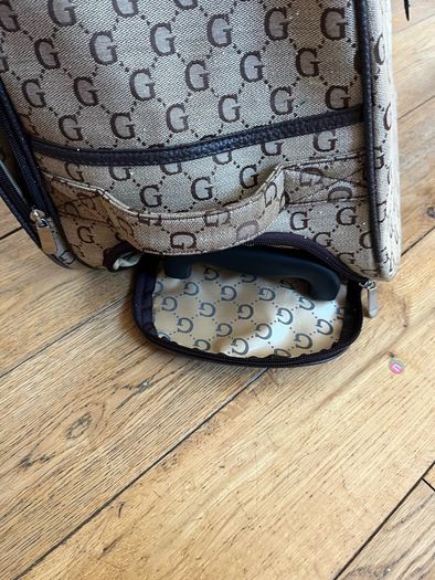 wheeled suitcase bag with long handle and short carry handles