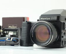Mamiya 645 Super Kit; Near Mint Condition Recently serviced Mamiya 645 Super with Tamron Sekkor 80mm 1.9 lens; Mamiya 645 AE Prism Finder; Mamiya 645 Super Waist Finder Viewer with magnifier; Mamiya 645 Super Motor Power Winder Grip; Darkslide; Extra Film