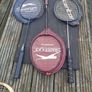 Four badminton rackets and one squash racket Image 3