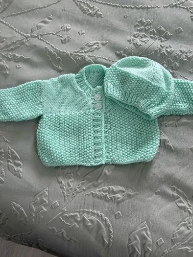 hand knitted baby blankets and cardigans