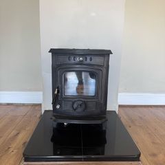 Solid fuel stove with back boiler