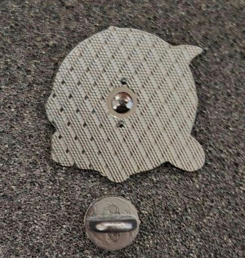 Tom and jerry , pin back badge.