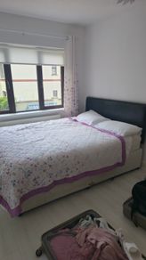 Double beds and kitchen seats