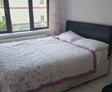 Double beds and kitchen seats