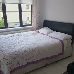 Double beds and kitchen seats