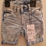 A selection of brand new baby clothes and items Image 2