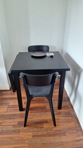 Drop-leaf dining table with two chairs