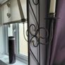 Wrought iron mirror with candle stands either side Image 6
