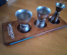 Smithwicks board with cocktail measures