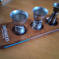 Smithwicks board with cocktail measures