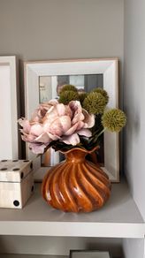 Faux flowers in Vase