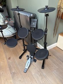 Gear4music DD200X electronic drum kit with an Alesis kick pedal