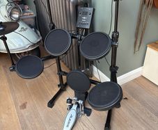 Gear4music DD200X electronic drum kit with an Alesis kick pedal