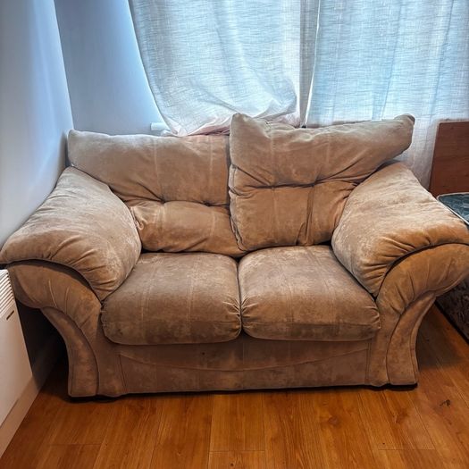 Couch with a  2 seater and a puffer