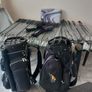 A selection of golf clubs and bags. Image 8