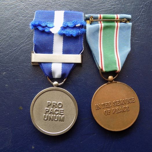 Pair of UN /Euro Medals. Issued to Irish soldiers.Full size.