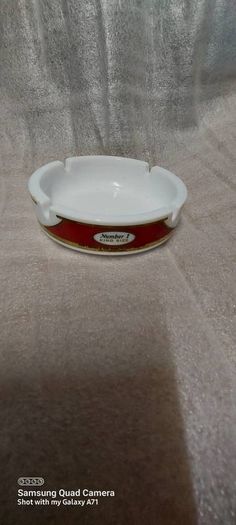 Carrolls no1 ashtray,nice condition,,price includes post to anywhere in ireland,collectors item ,with smoking ban..sold as seen.