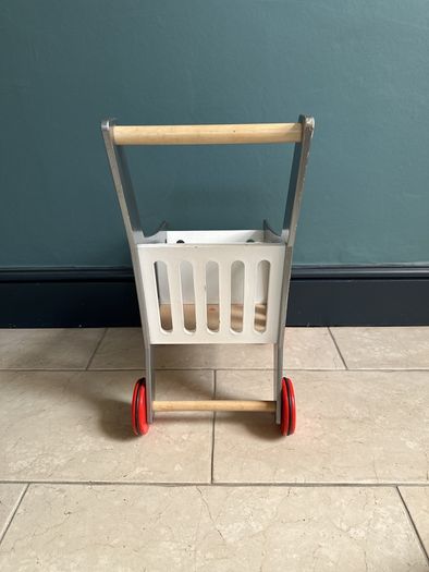 Kids wooden shopping trolley