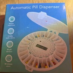 Automatic pill dispenser