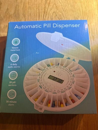 Automatic pill dispenser