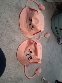 Two Brand New with tags 'Press my paws to move my ears' Sun hats both Age 7-9 years