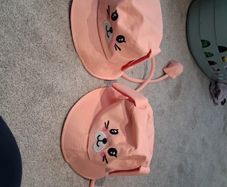 Two Brand New with tags 'Press my paws to move my ears' Sun hats both Age 7-9 years