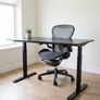 Electric Height Adjustable Desk. Modern Black Office Setup Image 2