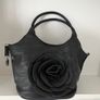 Handbag dressy occasional crossbody bag. Black Medium Size hand bag With Large Flora Feature . Detachable strap. Excellent Condition. Bought In Toulouse. Image 3