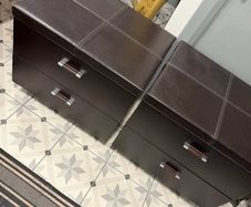 Two leather bed side lockers