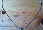 silver necklace and pendant