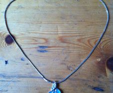 silver necklace and pendant