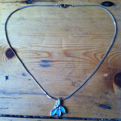 silver necklace and pendant